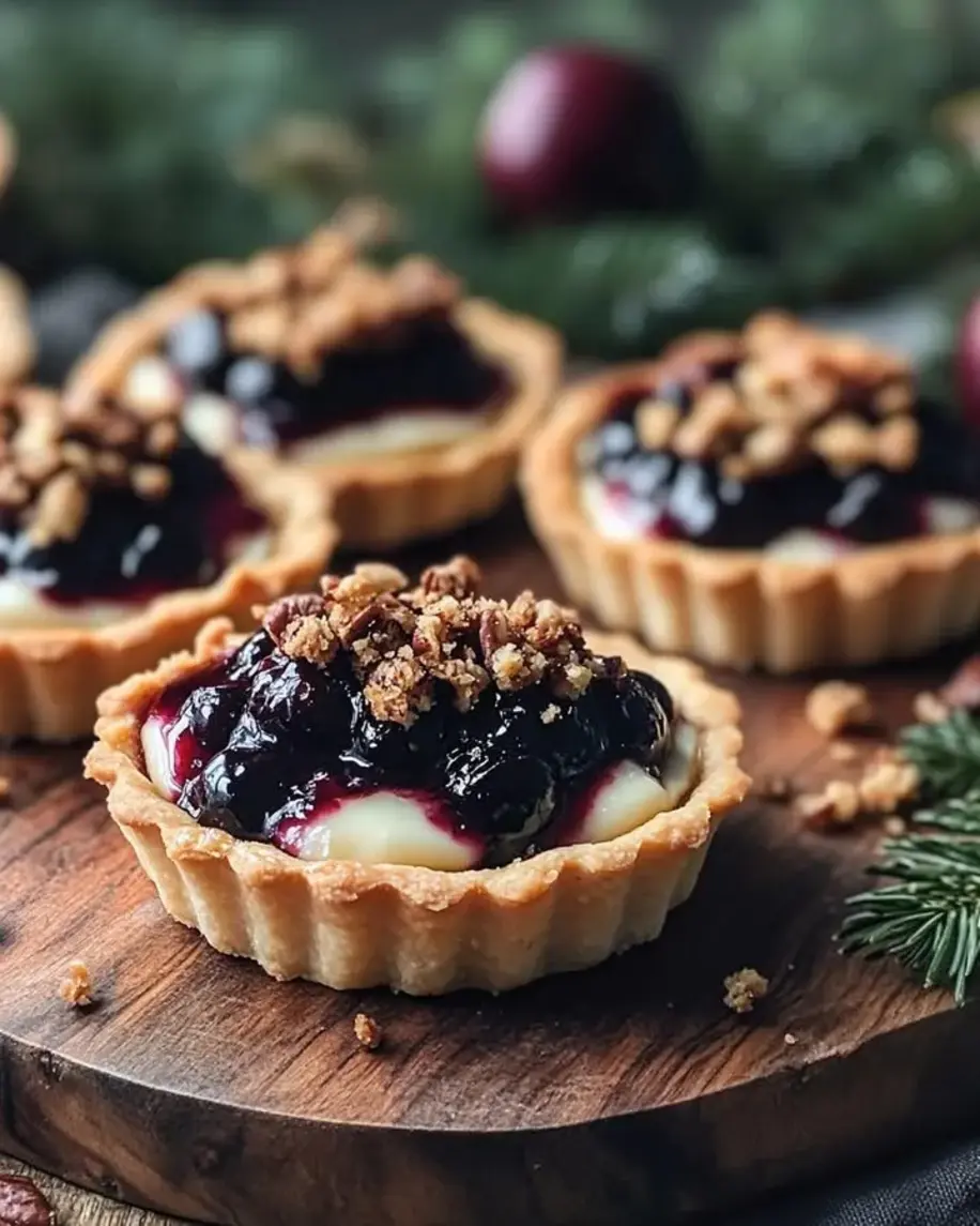 Baked Brie Black Cherry Tartlets with Hazelnut Crumble