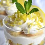 Ingredients for lemon tiramisu with ladyfingers, lemons, mascarpone cream, sugar, eggs, and lemon curd components